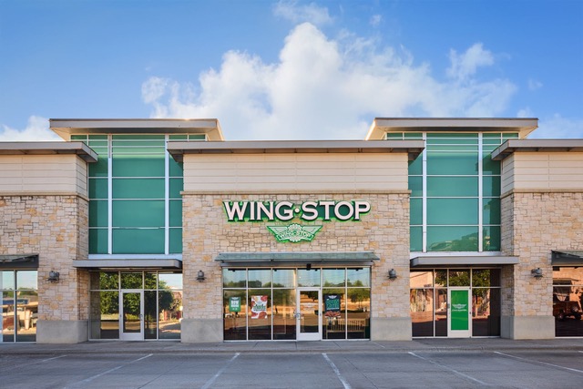 A Wingstop restaurant on a sunny day